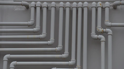 Pipes running along a wall