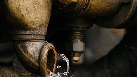 Water drop on a brass pipe